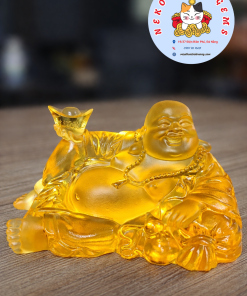 Tượng Phật Di Lặc đá lưu ly tay cầm thỏi vàng để ô tô